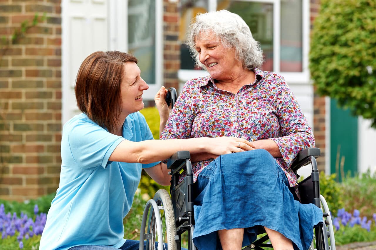 A ProCare carer supporting a service user at home