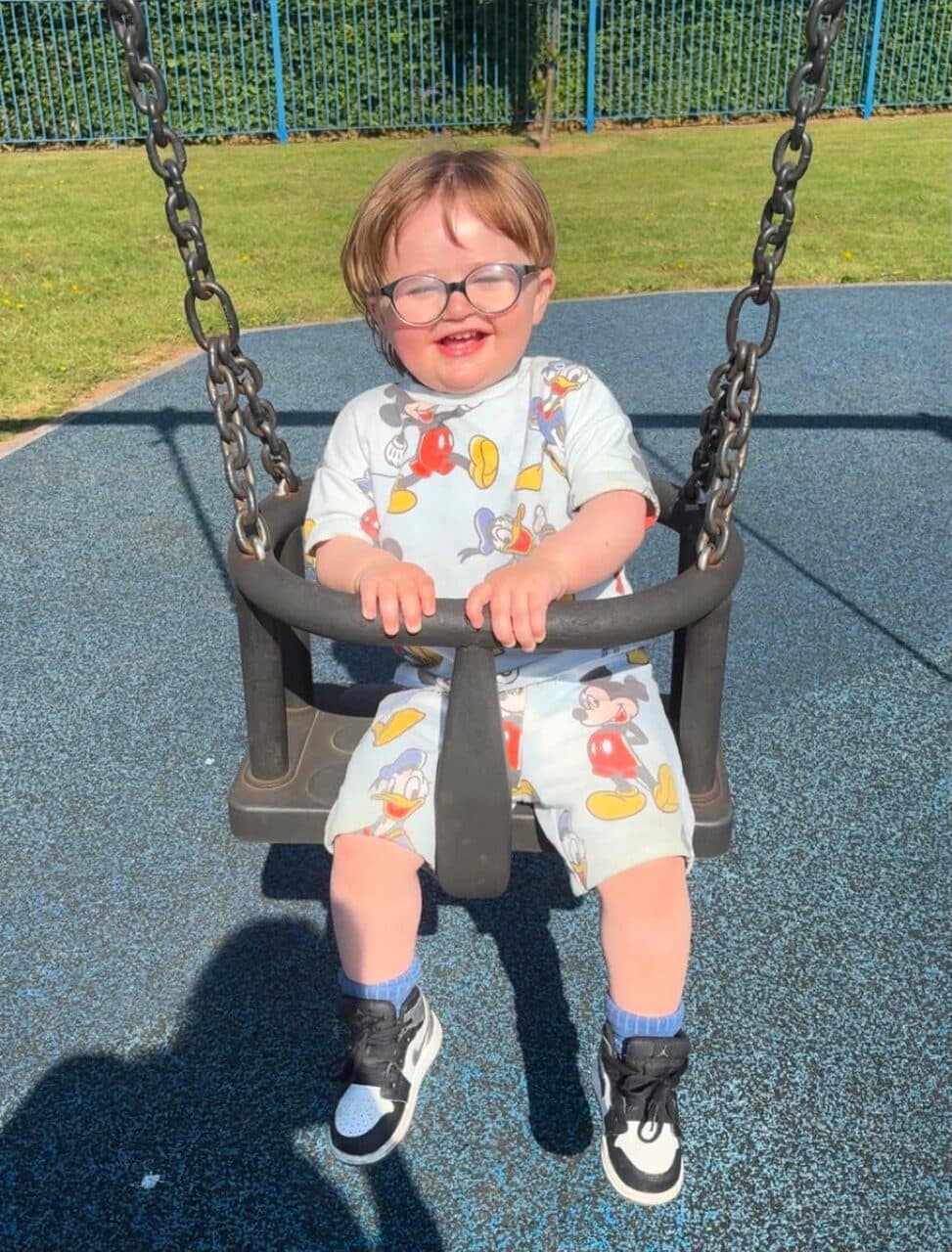 A child enjoying the playground with ProCare support